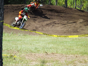 FLMN - Johnny Wasco and Bo Partin battle at motocross race.